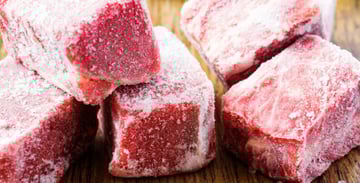 Frozen cubes of meat. 